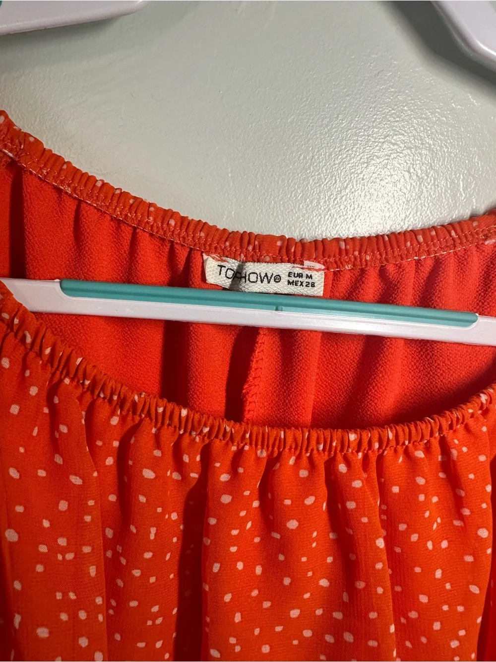 Orange Dot Peplum Smocked Blouse